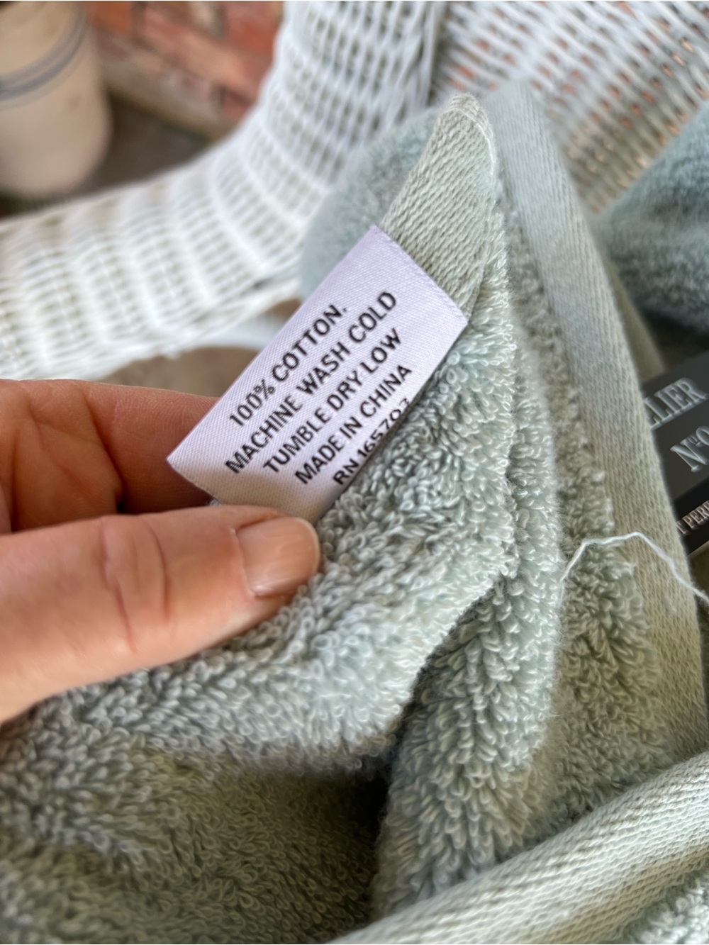 Sage green Atelier No. 9 bath towel features Duet Performance Technology - Picture 6 of 7